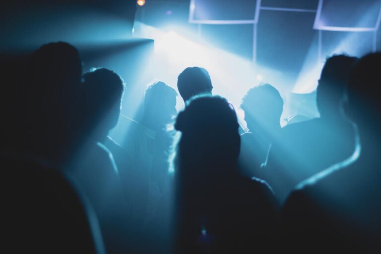 Silhouettes of a crowd at an 18th birthday